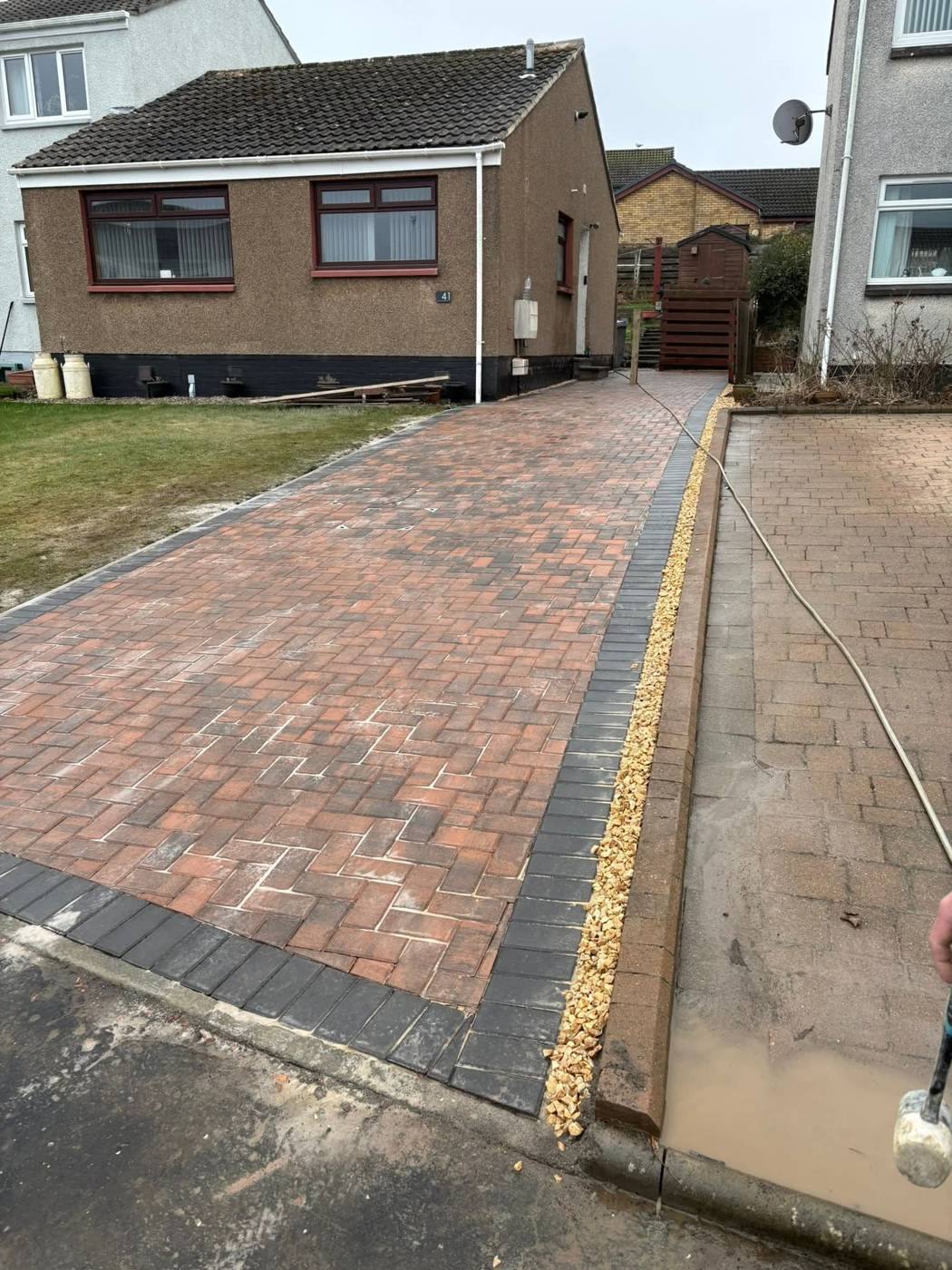 New red and black block-paved driveway at the same bungalow