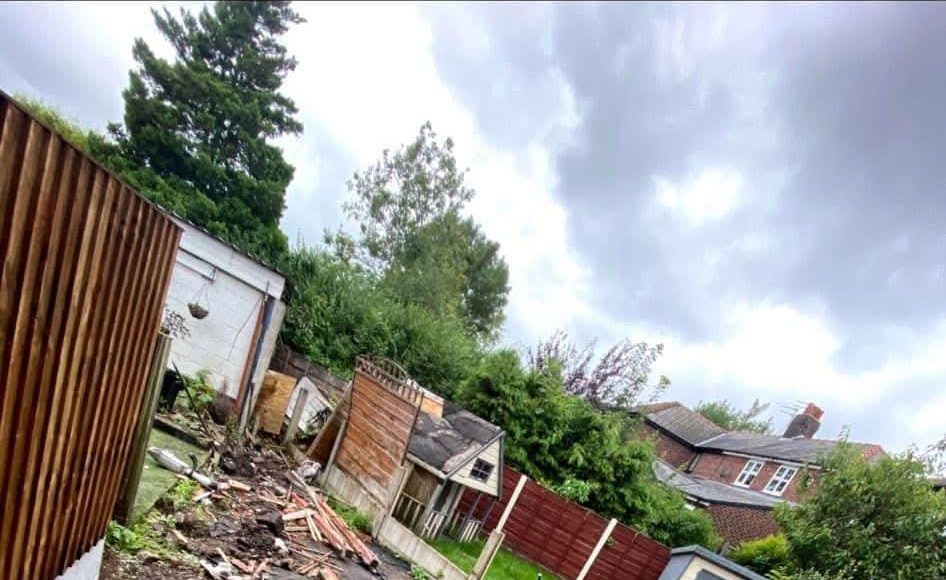 Garden being cleared, with the old surface taken up